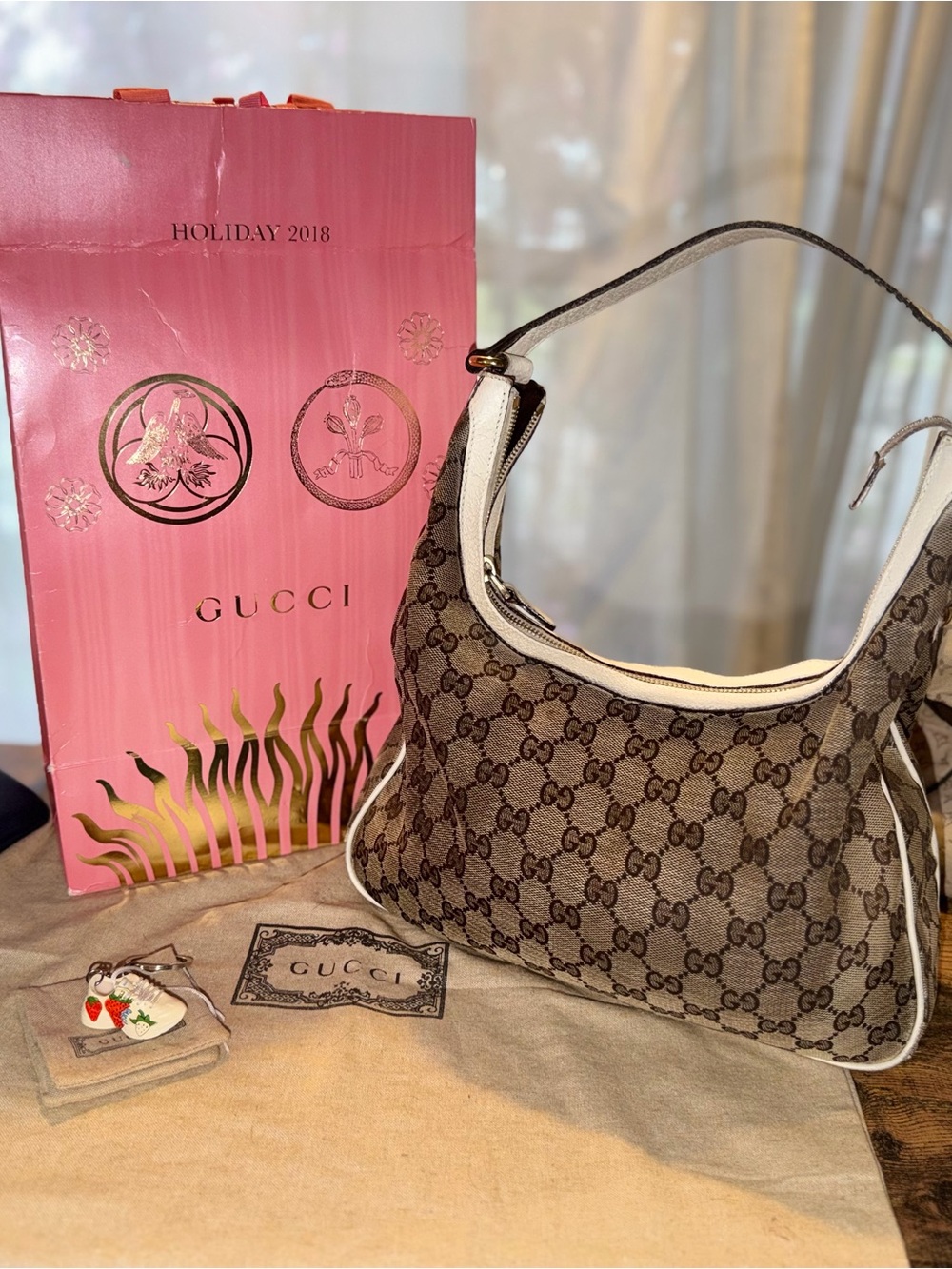 Gucci Brown GG Supreme Shoulder Bag with White Trim and Leather Accents